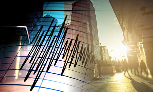 Stock chart in the back drop of a commercial area in sunset