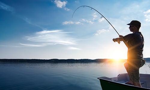 Man fishing from boat